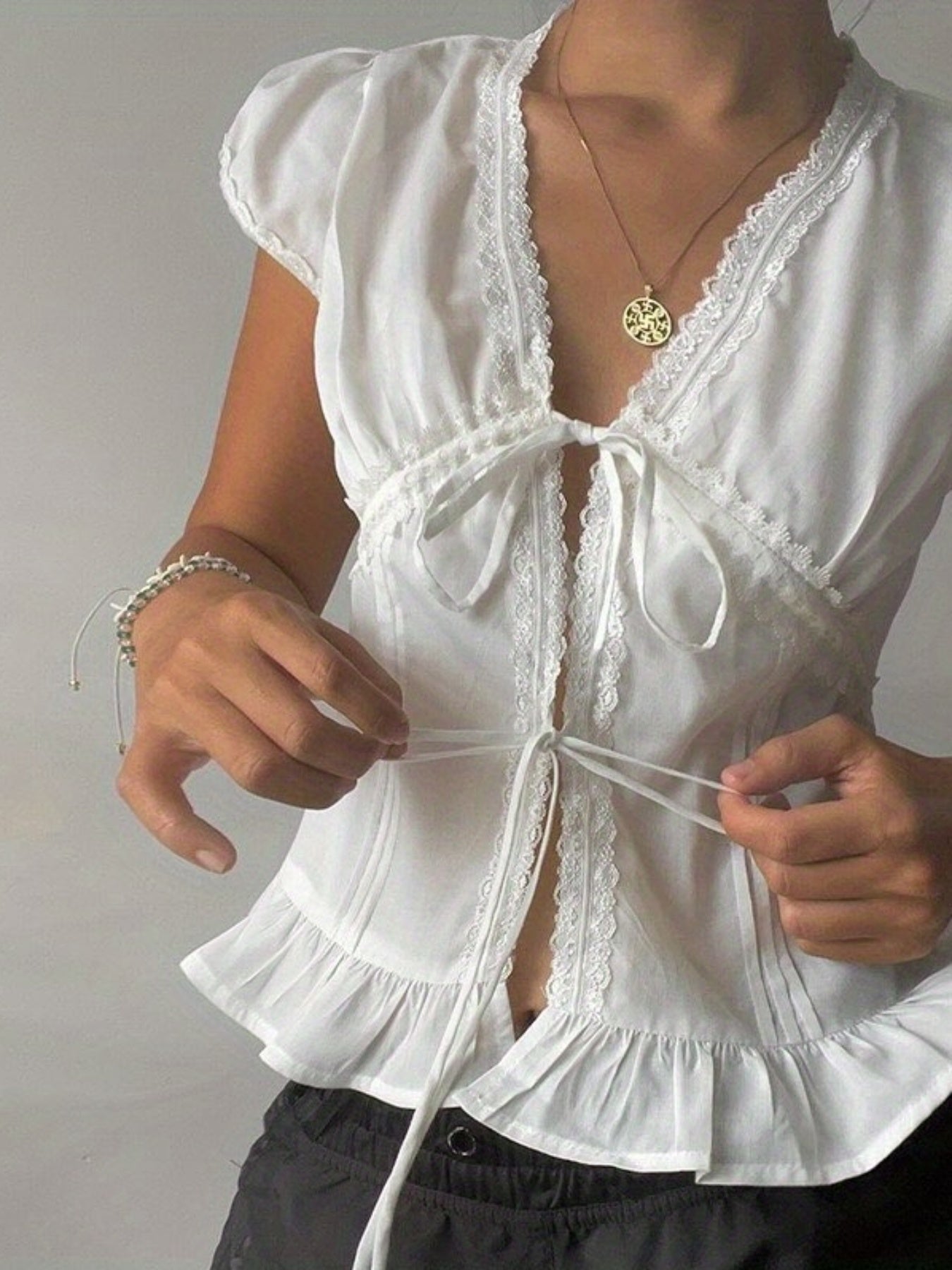 Women'S Casual Lace-Embellished V-Neck Top with Ruffle Hem - Light Blue, Short Sleeve, Summer Blouse with Front Tie Detail, Lace Trim, Non-Padded, Casual Summer Top|Ruffle Hem Top|Lace Trim Detail